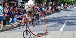 A racer on the crowd lined streets